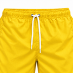 Riviera Retro zwemshort Sunbeam Yellow, geel detail van elastische tailleband en wit trekkoord